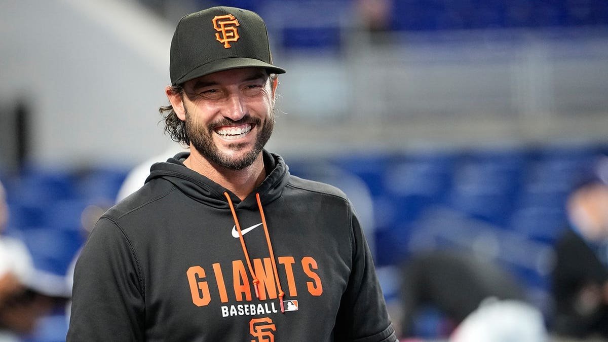 San Francisco Giants manager Tony Vitello watching batting practice before a baseball game.