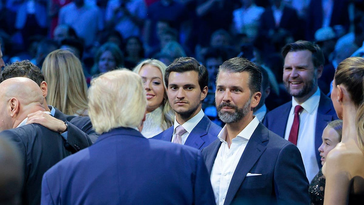 U.S. President Donald Trump, Tiffany Trump, Michael Boulos, Donald Trump Jr., and Vice President JD Vance standing on the South Lawn of the White House.
