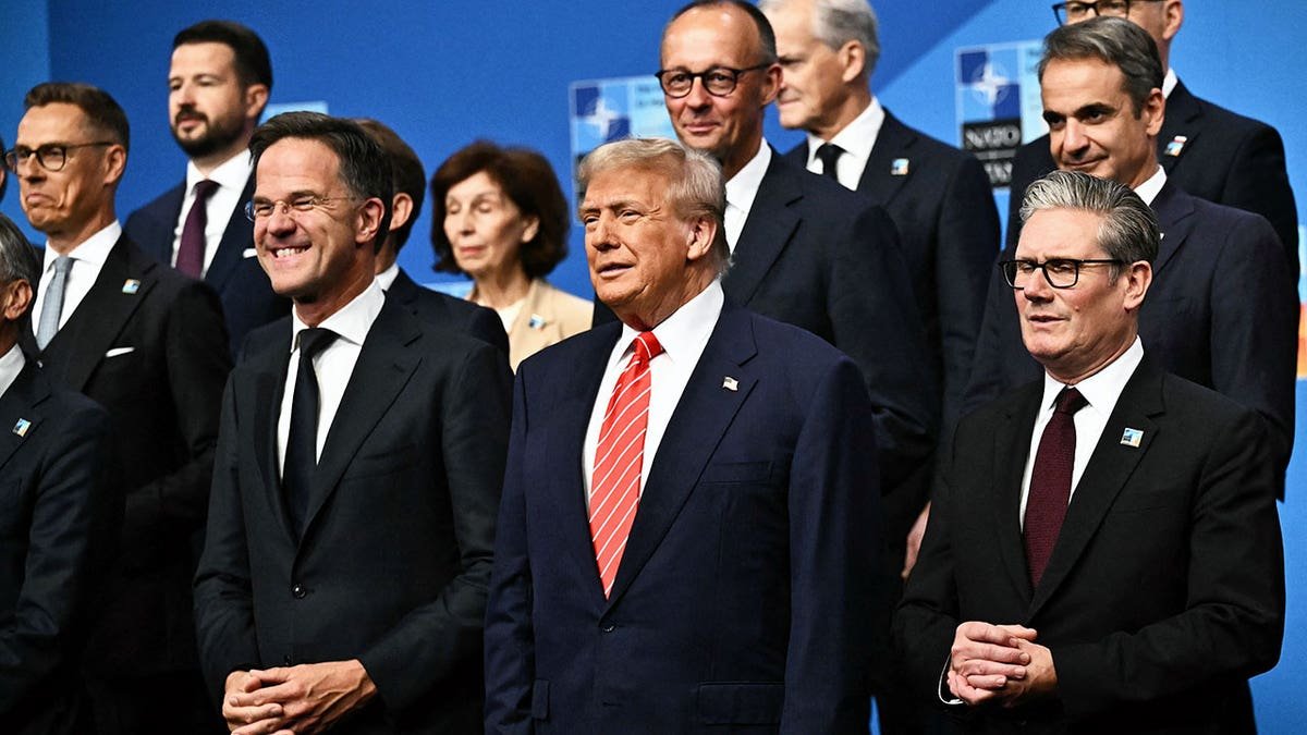 NATO Secretary General Mark Rutte, U.S. President Donald Trump and Britain's Prime Minister Keir Starmer posing with NATO leaders