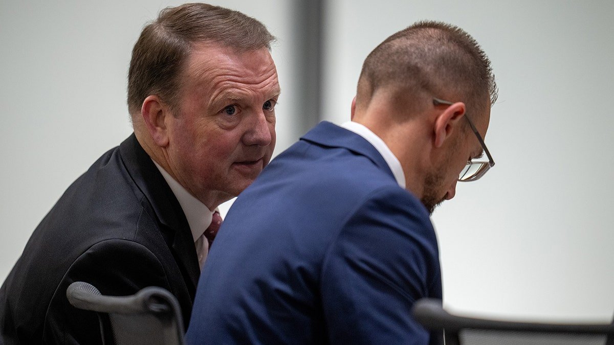 Deputy Utah County Attorney Christopher Ballard and Deputy Utah County Attorney Ryan McBride seated in 4th District Court in Provo