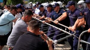 Albanian police fire water cannon as Trump-linked protests boil over