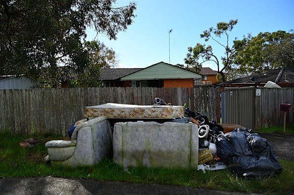 Rubbish and household items discarded near homes in Gorokan 