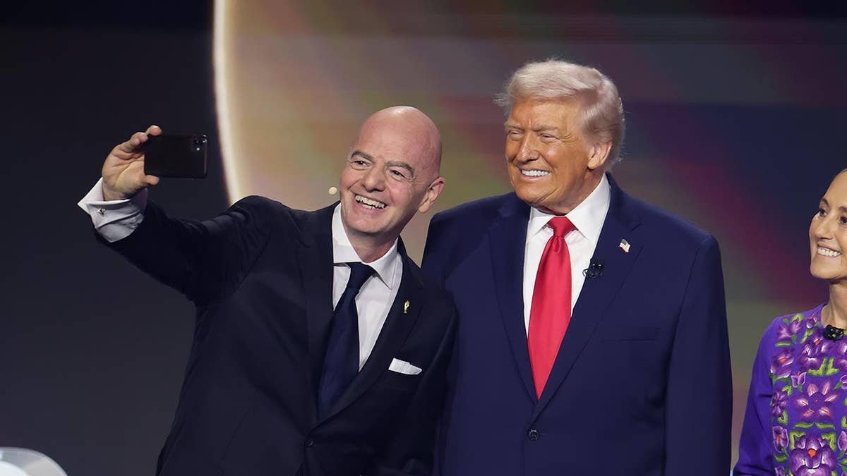 U.S. President Donald Trump and Gianni Infantino pose for a selfie with Claudia Sheinbaum and Mark Carney at the FIFA World Cup 2026 draw.