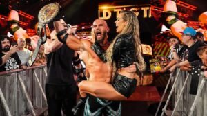 WWE’s Maxxine Dupri helps Austin Theory and Bron Breakker win World Tag Team Championship, seals win with kiss