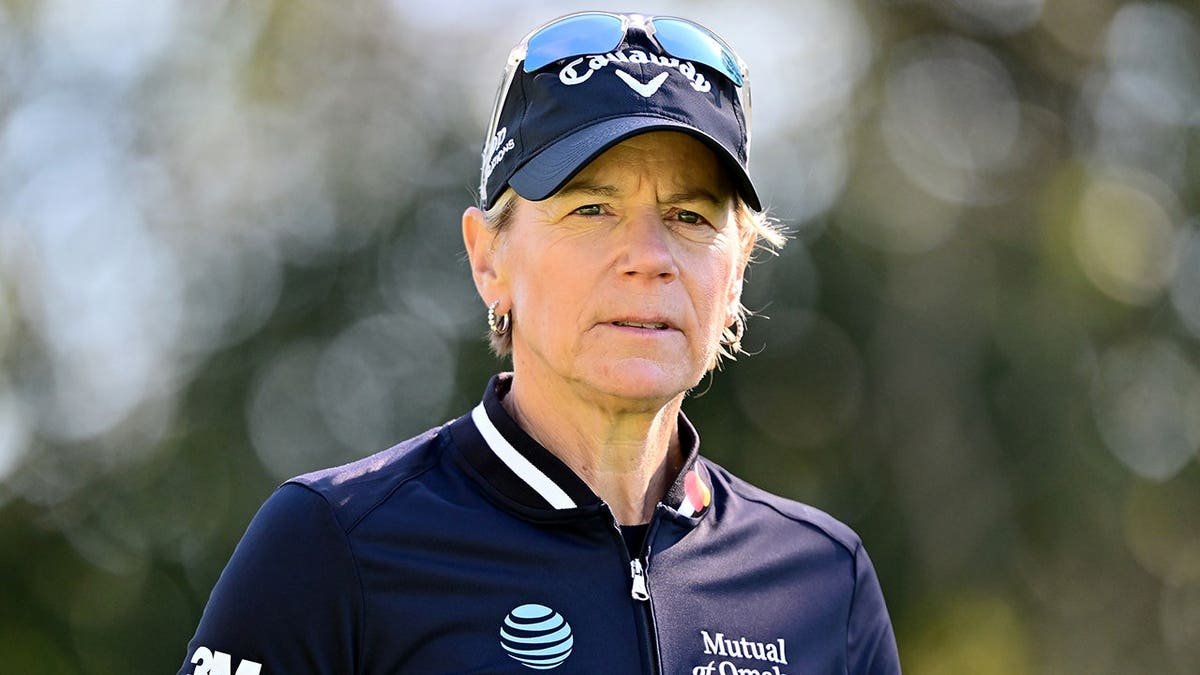 Annika Sorenstam looks on