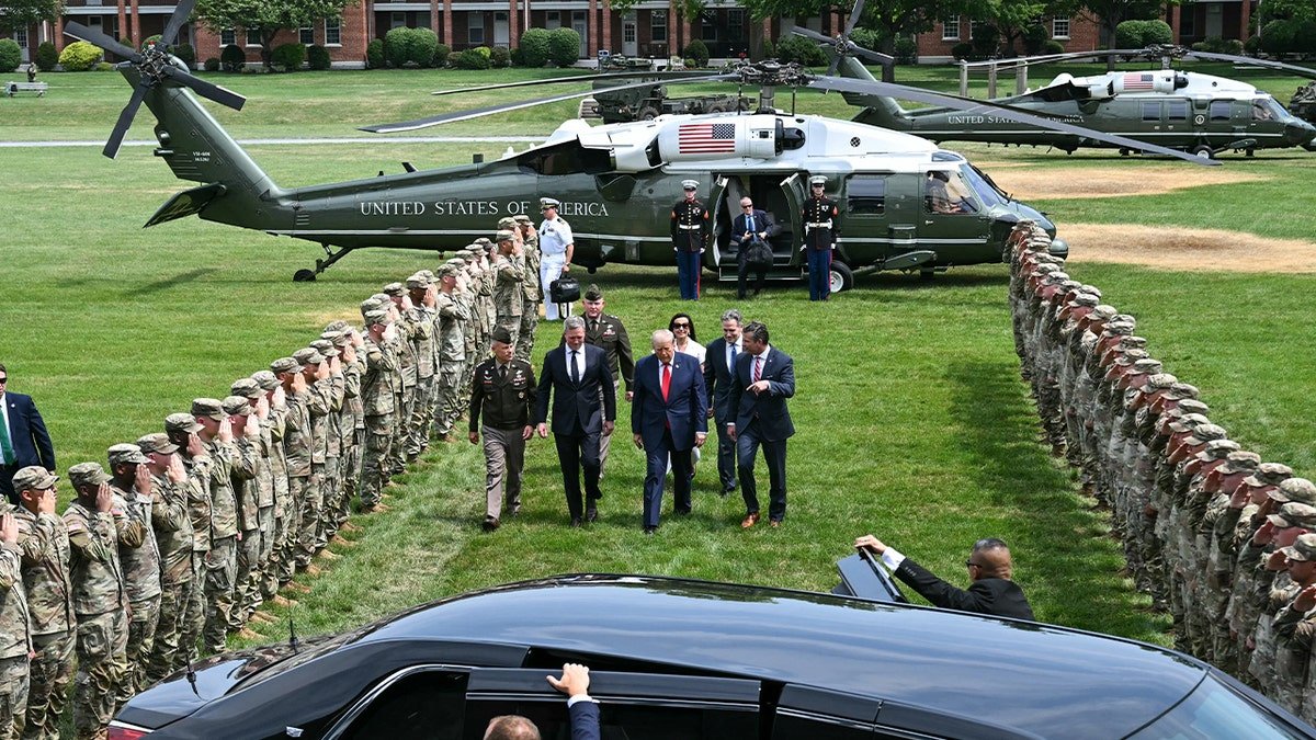 President Donald Trump speaks with Secretary of Defense Pete Hegseth upon arrival at the US Army War College Field Landing Zone, on his way to the Pennsylvania Defense and Innovation Summit at the US Army War College in Carlisle, Pennsylvania, on July 15, 2026.