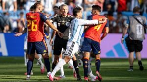 World Cup brawl sees Argentina player putting hand on throat of Spain opponent after match World Cup brawl sees Argentina player putting hand on throat of Spain opponent after match