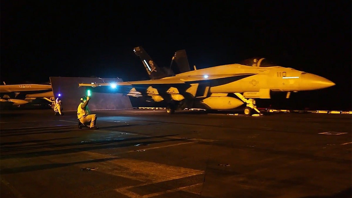 US military fighter jet takes off from aircraft carrier in support of Operation Epic Fury against Iran