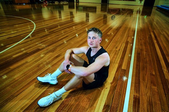 Anthony Audino rests after winning his round of the gruelling beep test.