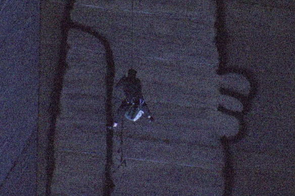 The vandal abseiled down the concrete stack in the early hours of Tuesday.
