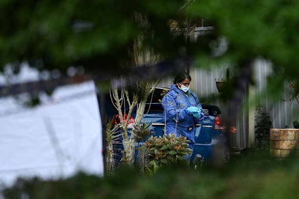 Police forensic officers at the crime  scene in Glenmore Park.