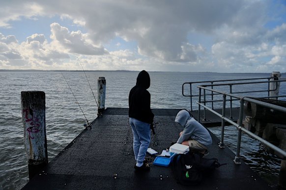 Boys fishing at Toukley on the Central Coast.