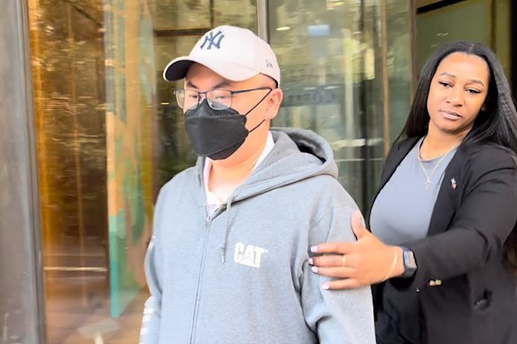 Surya Subekti (left) outside the Downing Centre Local Court in Sydney in 2024.