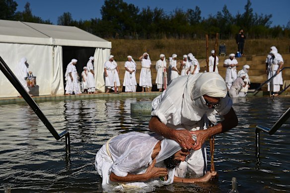 Tarmida (Mandaean priest) Mustafa al Nasar is baptised by the head of the Mandaean nation in Australia Rishama Salah Chohilil at the Wallacia Mandi.