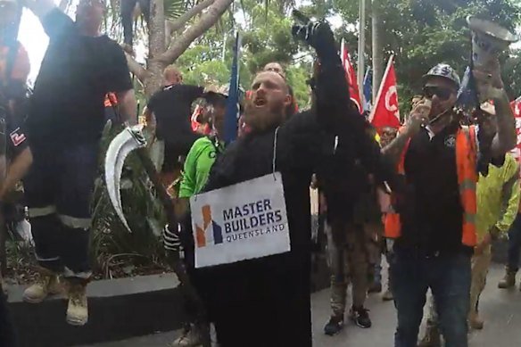 A man dressed as the Grim Reaper at a CFMEU rally in Brisbane in 2022.