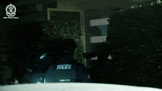 Police storm a Liverpool home as four teenagers are arrested in relation to multiple shootings.