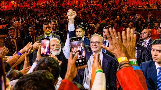 Indian Prime Minister Narendra Modi and his Australian counterpart Anthony Albanese exit the arena on Tuesday night.