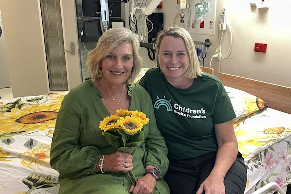 Jenny Jenner and Kerry Williams with the Queensland Children’s Hospital’s new cuddle bed. 