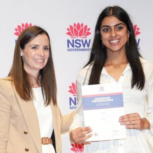 Mankirat Kaur receiving her certificate for first in course in English Standard from then-acting education minister Courtney Houssos in 2025.