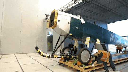 Installation of the Qantas planes at the Powerhouse Museum in Parramatta.