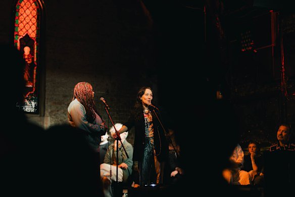 Kat Dopper speaking at the opening of the Divine Playhouse.