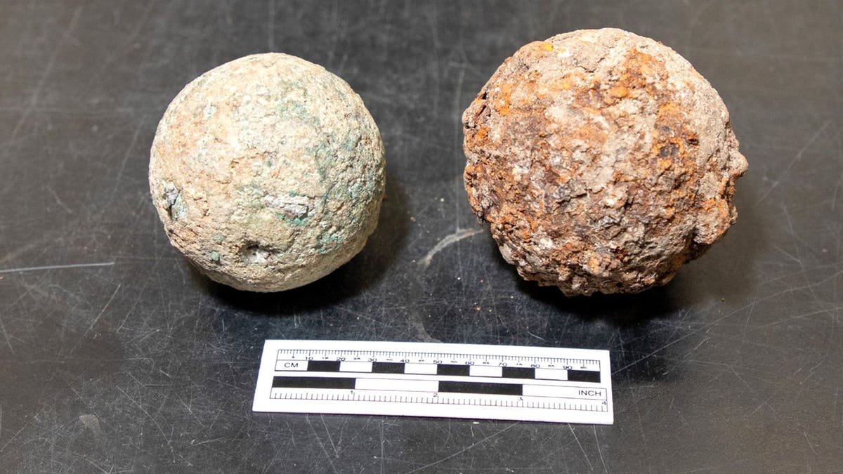 Two Alamo cannonballs next to each other