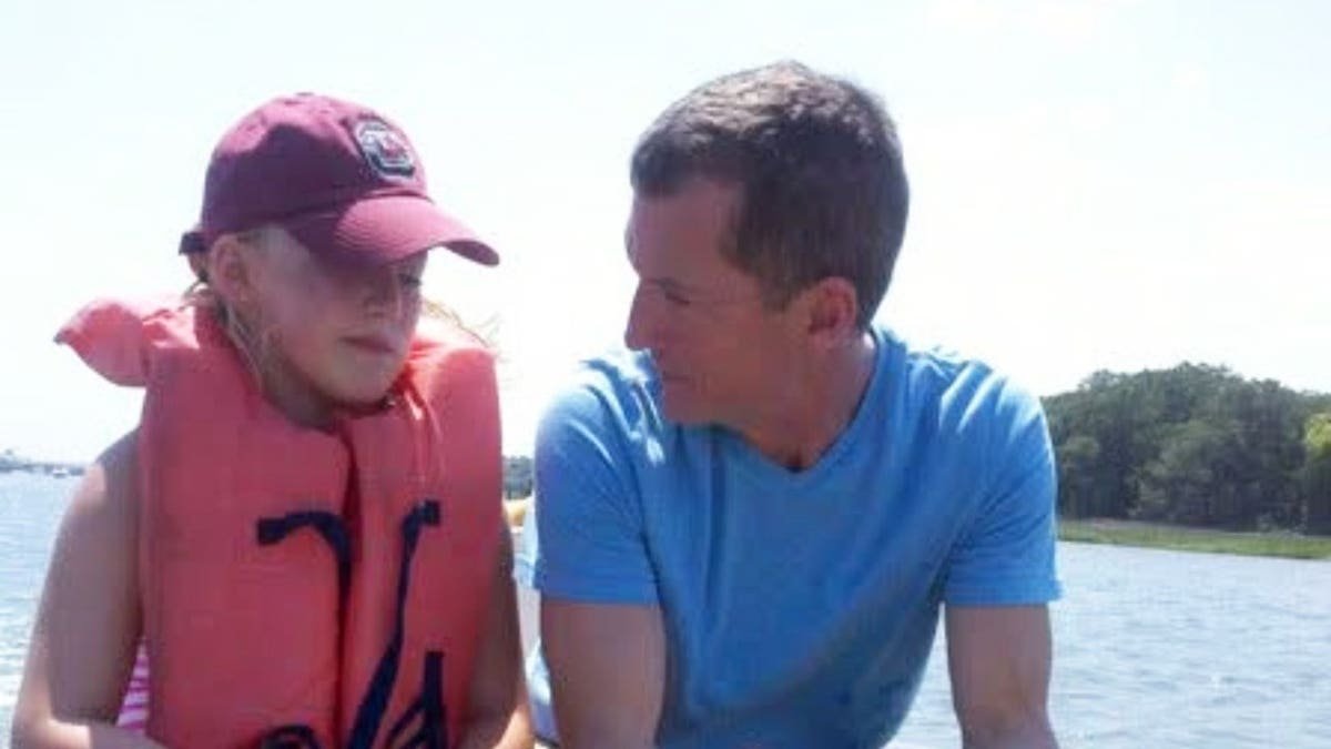 Eva Benefield and Doug Benefield out fishing.
