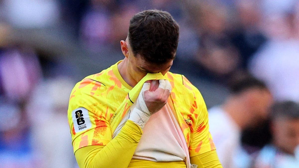 Matt Freese looks dejected on the field after the match in Seattle.