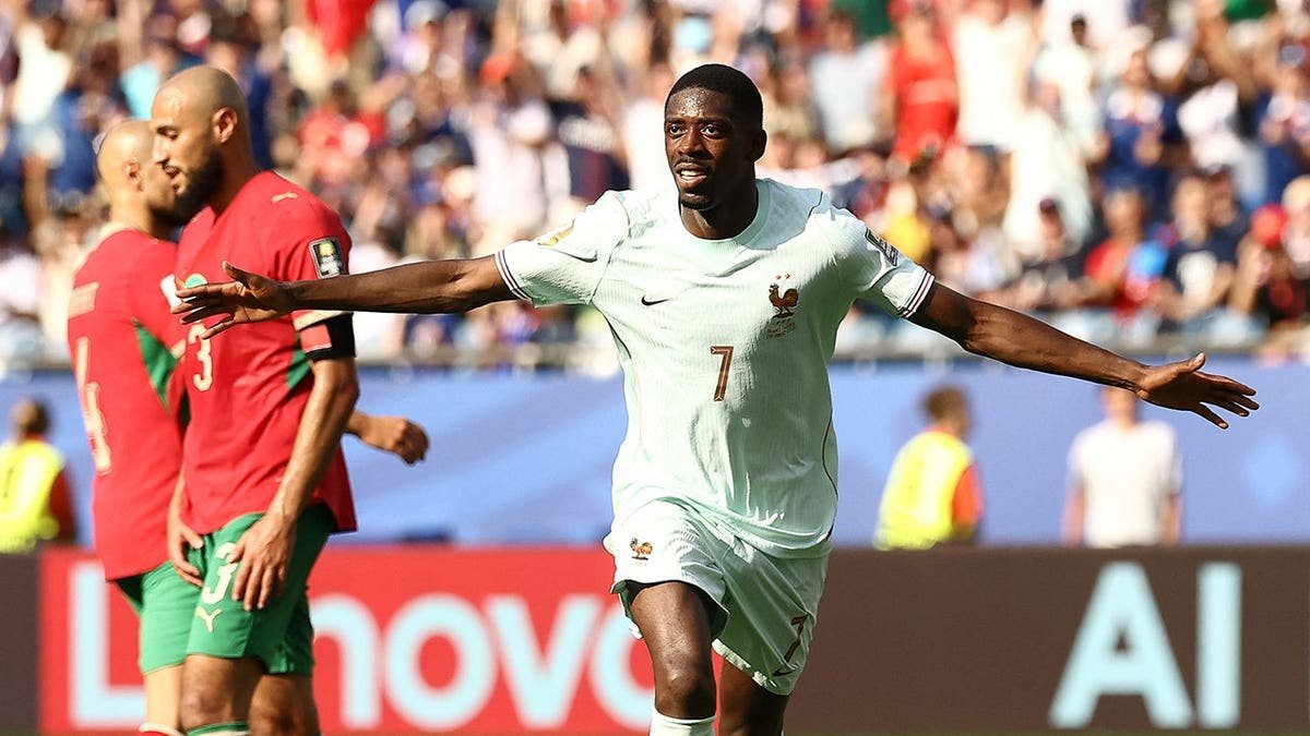 Ousmane Dembele celebrates goal