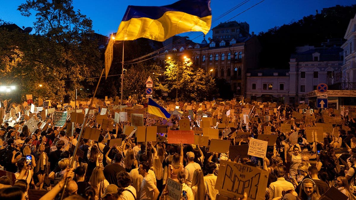People protest against Ukrainian President Volodymyr Zelenskiy's decision to replace Mykhailo Fedorov as defense minister