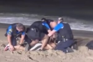 Virginia Beach cop dodges wild karate move while chasing martial arts master in viral video
