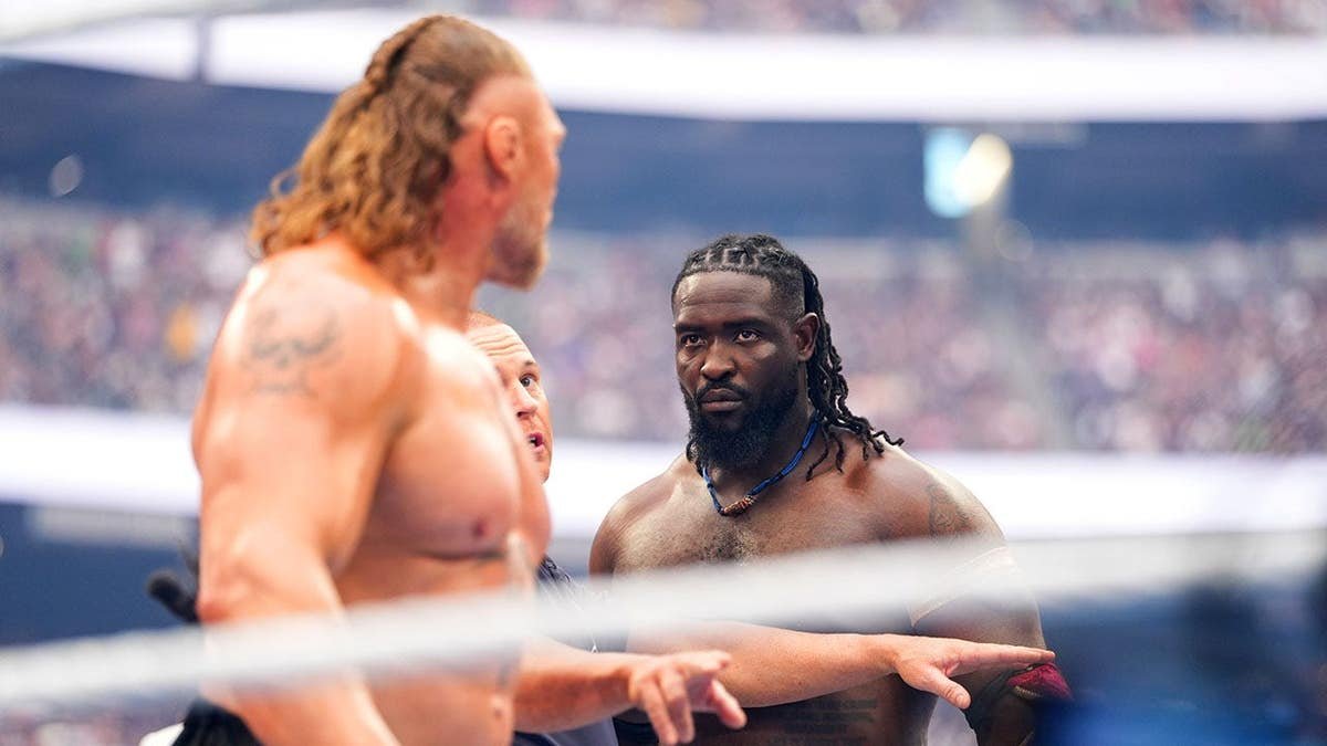 Oba Femi stares down Brock Lesnar