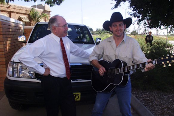 John Howard with musician Lee Kernaghan in Longreach in 1999.