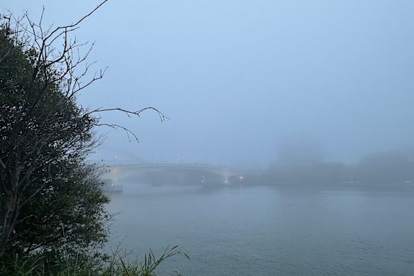 Fog descends on the Go Between Bridge.