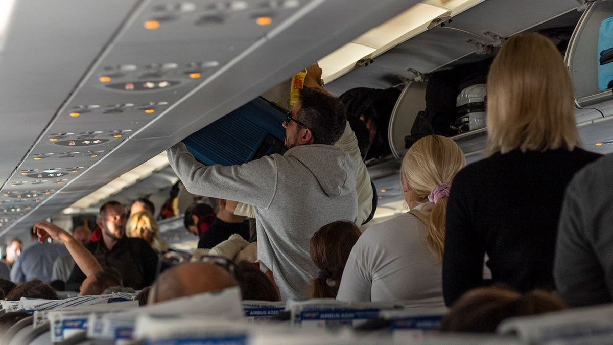 Passengers board plane