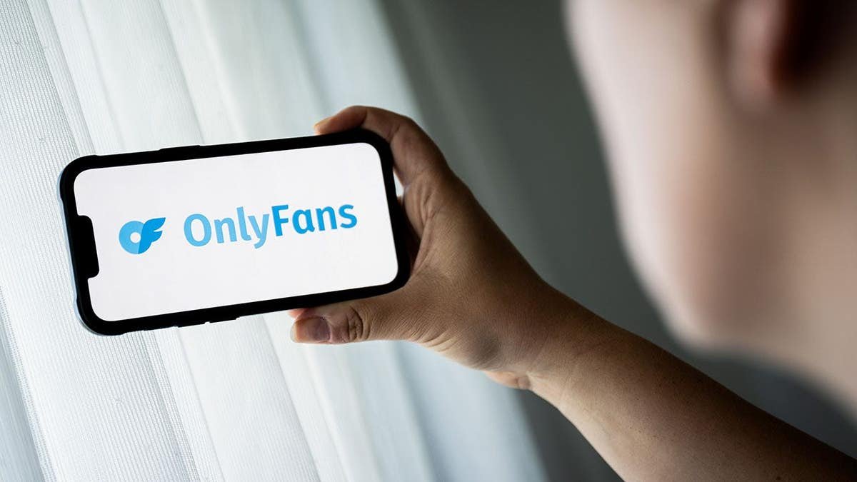 In this photo illustration, a OnlyFans logo is seen