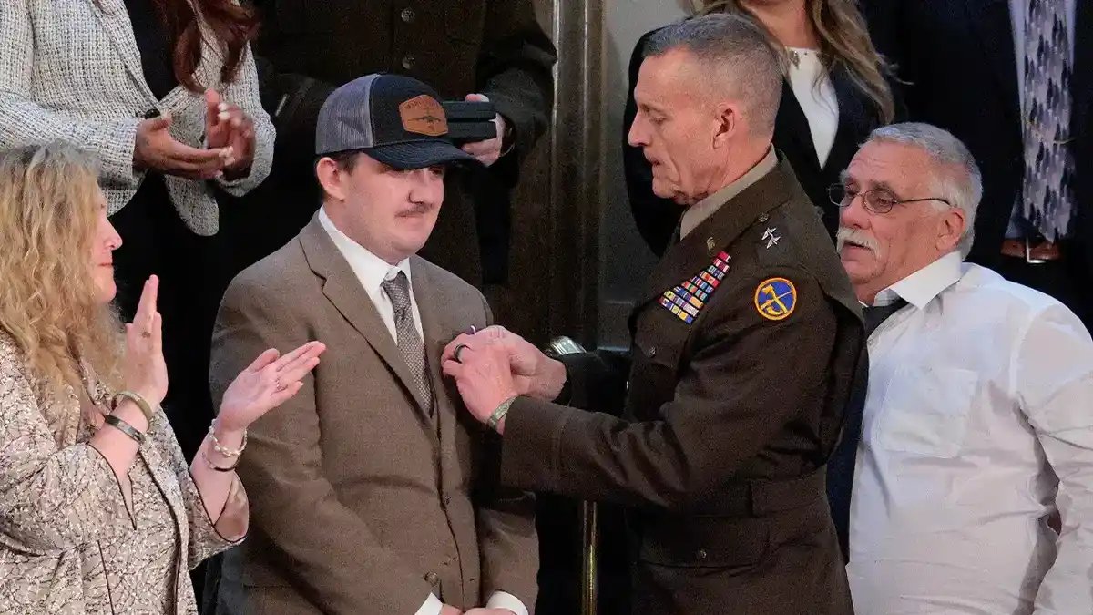 Andrew Wolfe is presented with the Purple Heart