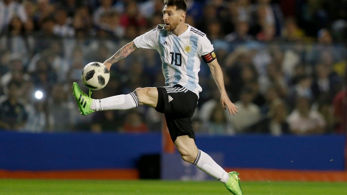 Argentina's Lionel Messi controls the ball
