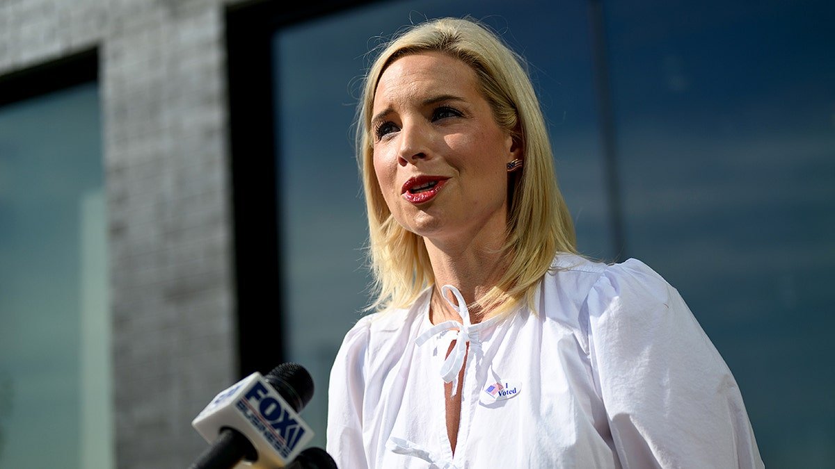 Ashley Hinson talking to reporters