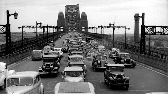 Hive of activity: a traffic jam on the bridge in 1946.