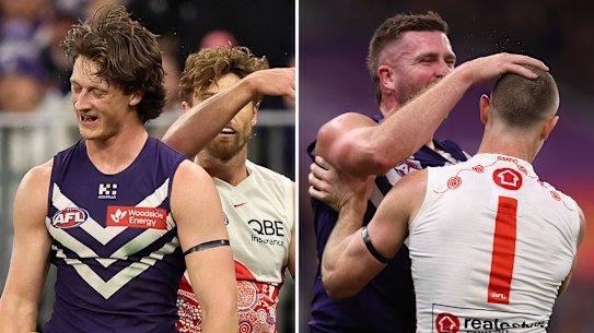 Jye Amiss of the Dockers receives a free kick after getting tapped on the head by Dane Rampe. Luke Ryan of the Dockers rubs the head of Chad Warner of the Swans to give away a free kick.