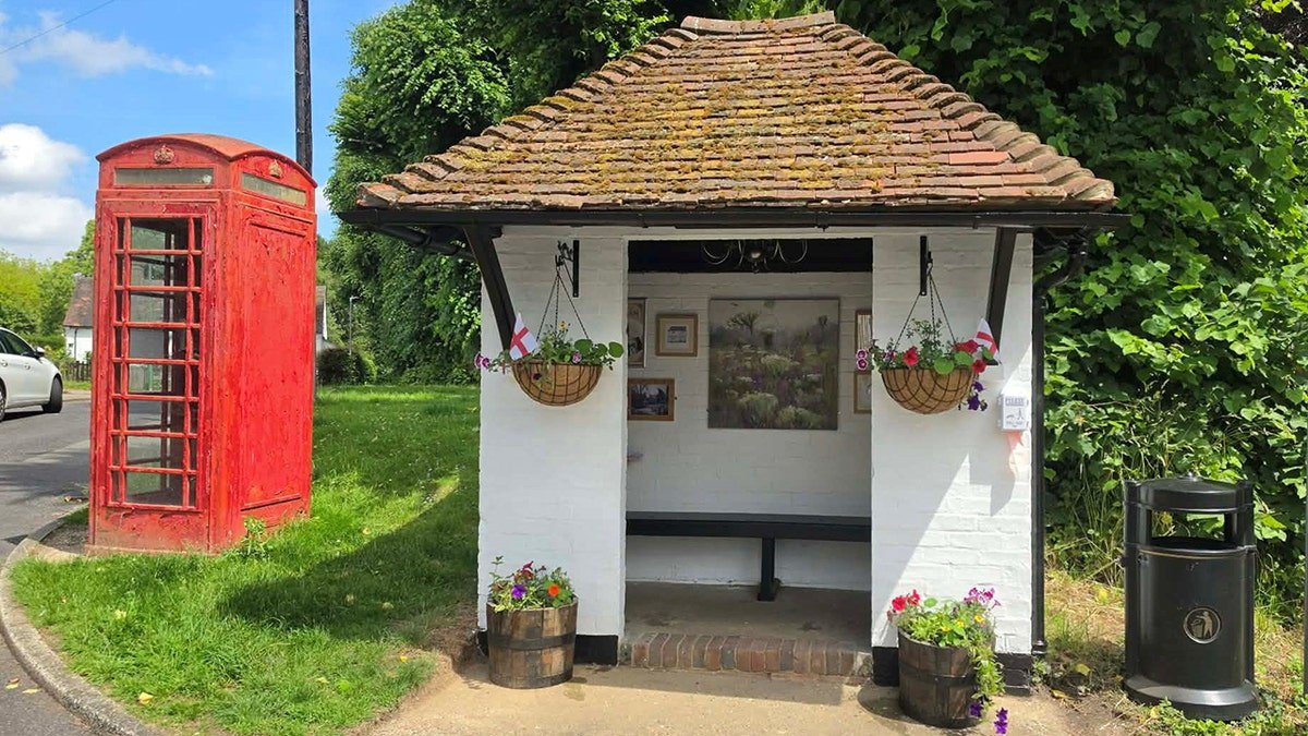 At decorated bus stop in Britain.