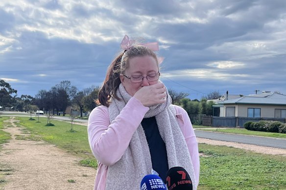 Layla’s aunt, Kaitlyn Cheyne, speaks on Saturday outside the family home where Layla was last seen.