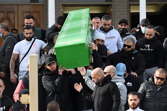 Mourners carry the coffin of Bilal Hamze after a service at Lakemba Mosque.