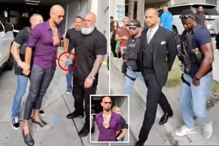 Andrew Tate arrest video shows moment he tried to give phone to bodyguard as he’s cuffed by US Marshals Andrew Tate arrest video shows moment he tried to give phone to bodyguard as he’s cuffed by US Marshals