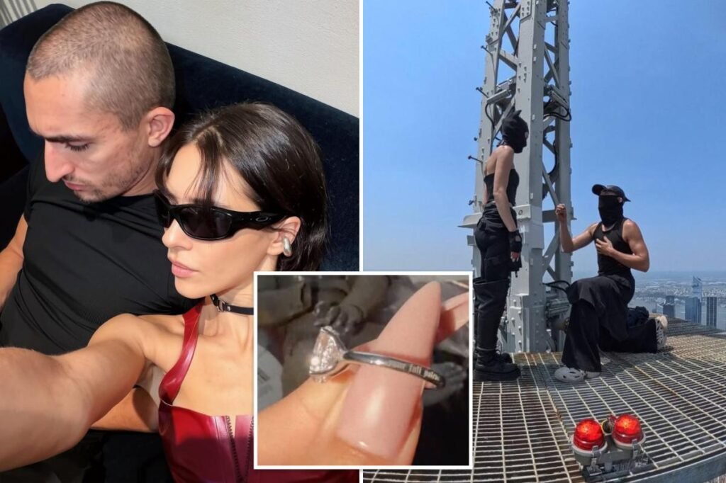 Daredevils arrested after scaling Empire State Building in wild NYC engagement stunt finally get ring back