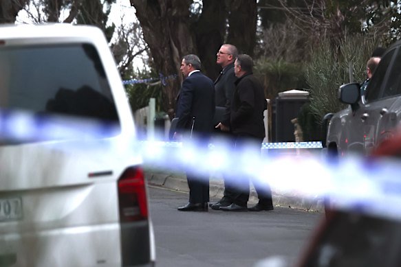 Detectives at the crime scene on Wednesday morning.