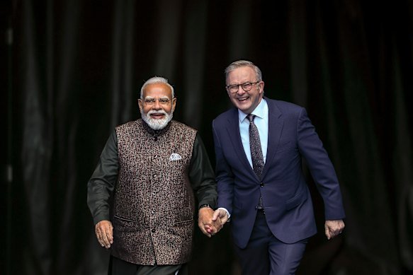 Prime Minister Anthony Albanese and Indian Prime Minister Narendra Modi arrive at the MCG.