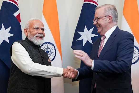 India’s Prime Minister Narendra Modi shakes hands with Anthony Albanese in Melbourne.