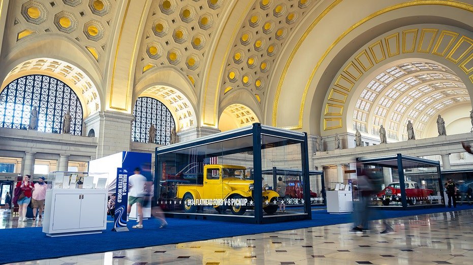 A 1934 Flathead Ford V-8 pickup is displayed inside Ford’s